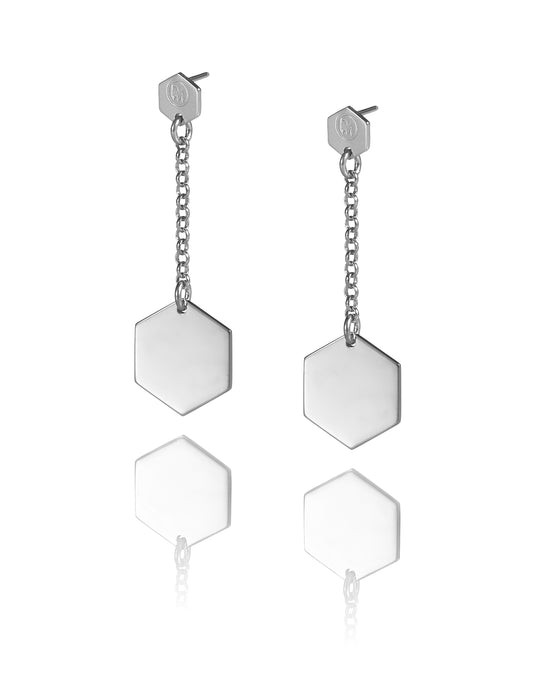 Minimalist and playful Cell earrings with hexagon-shaped pendants from iconic Cell collection by David&Martin. Material: 925 silver.