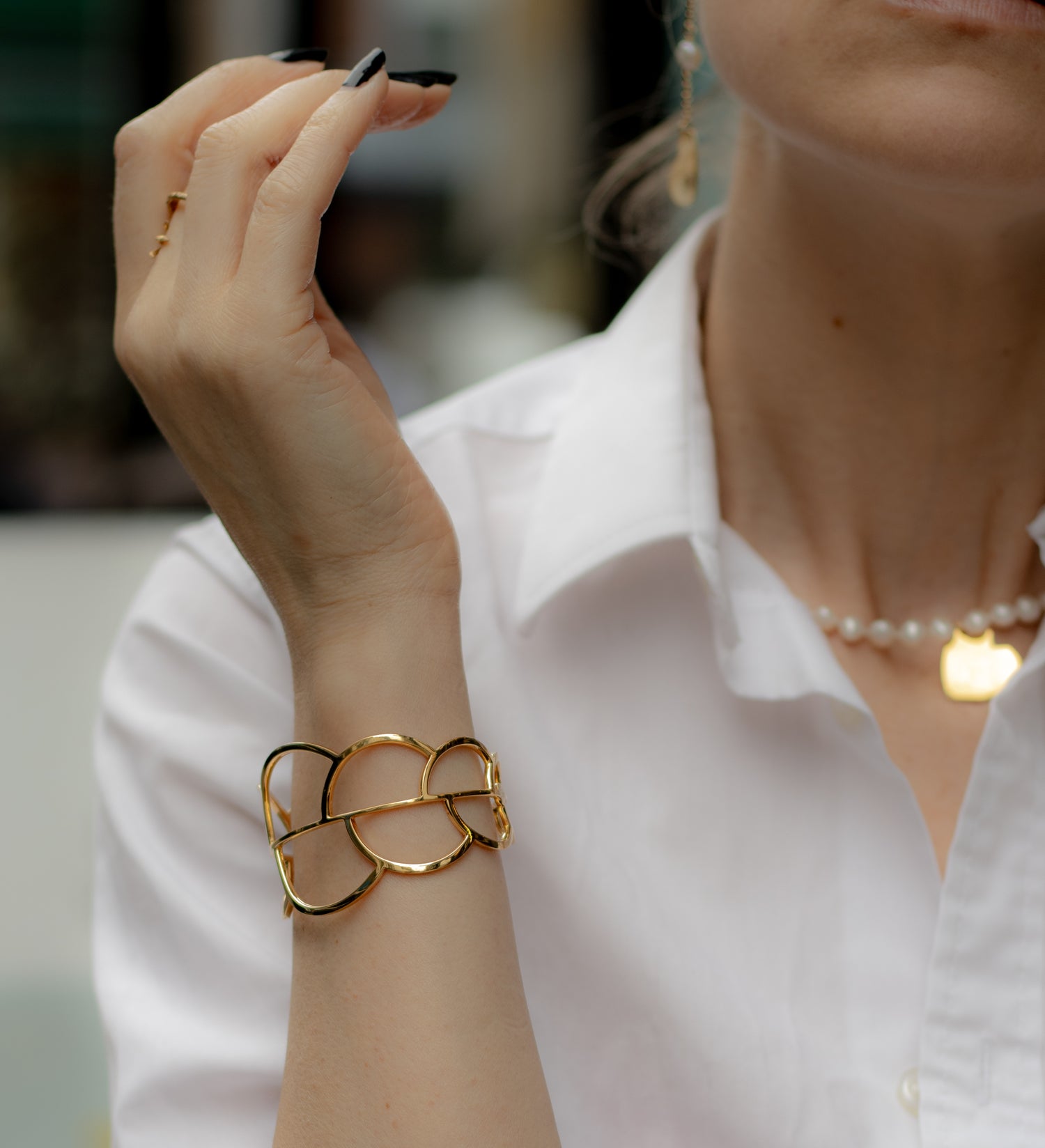 Drift cuff bracelet, 18 karat gold-plated silver