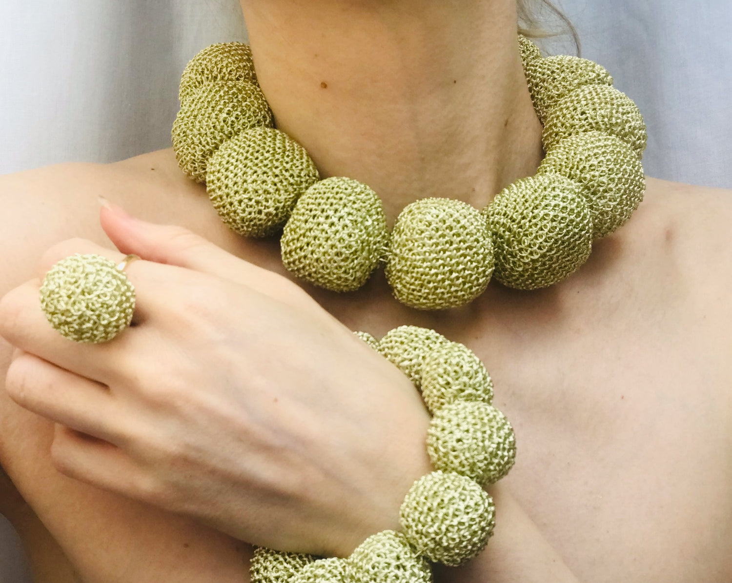 Unique, one of a kind, handcrafted bracelet made of oversized gold-plated wire pearls. Diameter of each pearl is 23mm, diameter of the bracelet is 13cm, length - 24cm, contains 9 pearls.  The collection is inspired by the colours and culture of Venice and is handmade in Italy.    Combines with Perle D'Oro necklace, earrings and Perla D'Oro ring from the same line. 
