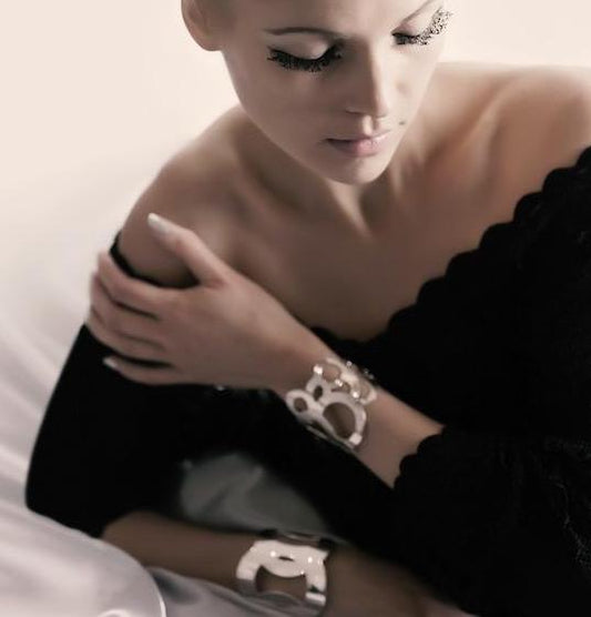 Popular, classy yet edgy cuff bracelet from Circles collection.   Material: 925 silver-plated brass.  Size: adjustable, fits any wrist.