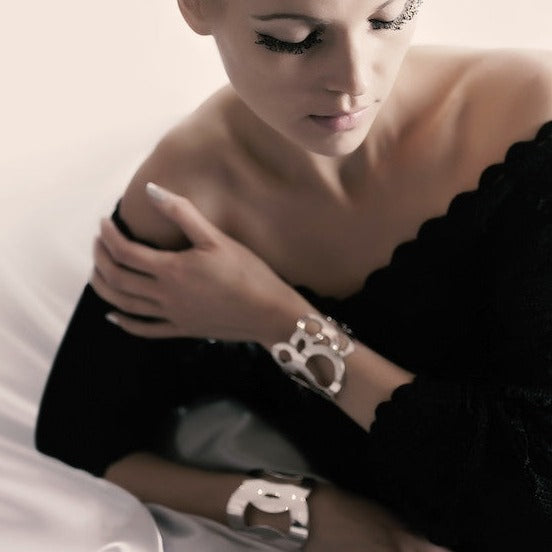 A chunky statement cuff from Circles collection.  Material: 925 silver-plated brass.   Size: adjustable, fits any wrist.