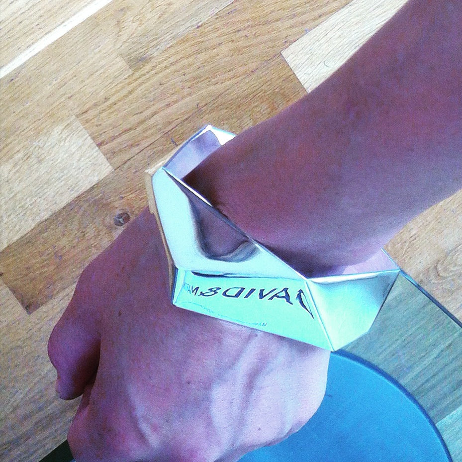 Striking, chunky statement bangle bracelet from iconic Facet collection.  Material: 925 silver.