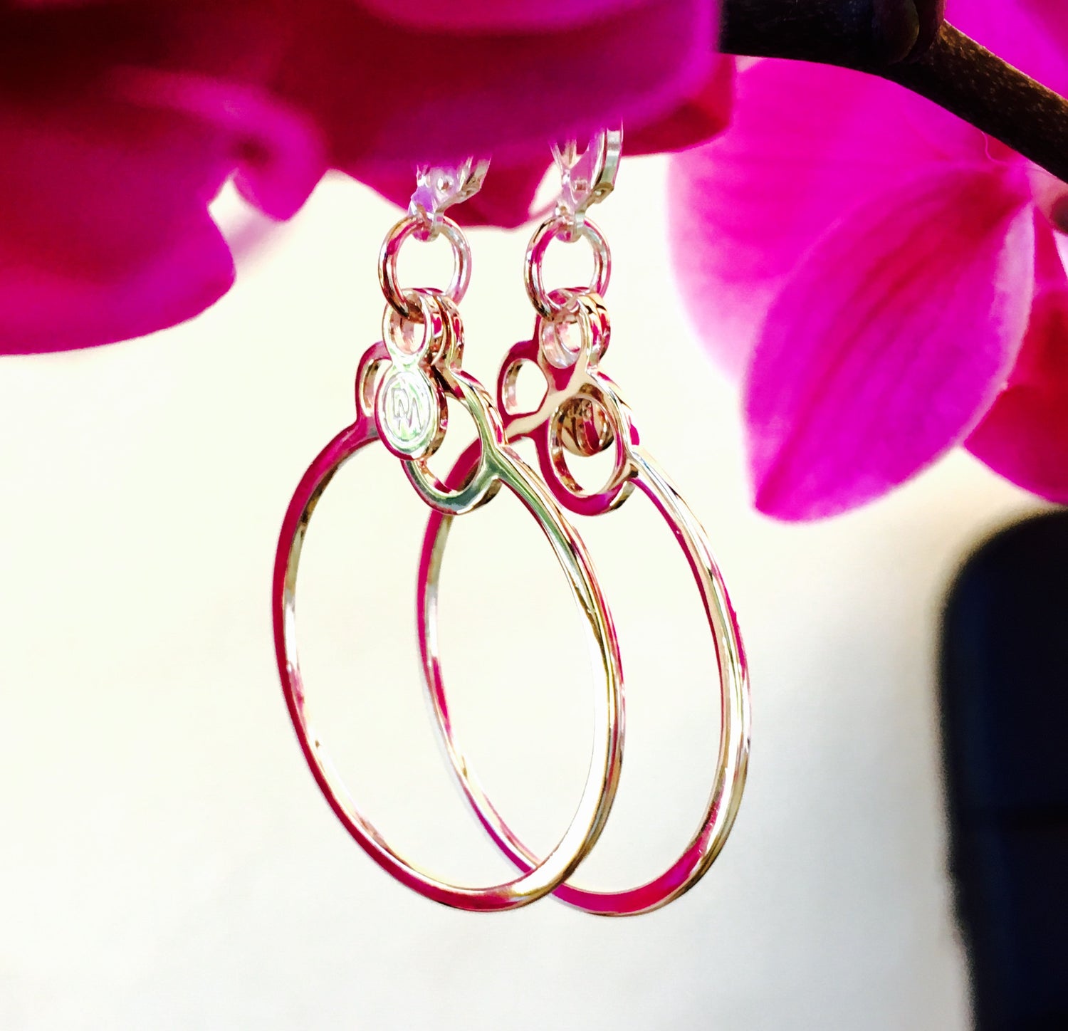 Extra light, gentle 925 silver hoop earrings with a logo from Circles collection.   Material: 925 silver.   Size: hoop diameter - 3cm.